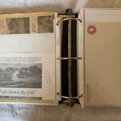 Left - Town of Sand Lake Settled by 1767 newspaper article continued: Right - Town of Sand Lake two cent and cent and a half pre stamped envelopes