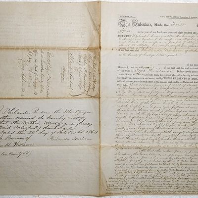 Doc # 96 Indenture 1852-04-01 P1-of-2: From Hezekiah C. Arnold, George C. Arnold, Stephen P. Hunt, and Joseph P. Alden to Philander Barbour. $2,000 mortgage issued by Philander to support the sale of property to the Arnolds, Hunt, and Alden. The reverse side notes full repayment on October 26, 1964.