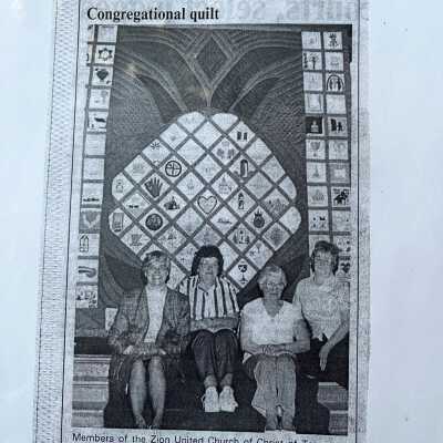 New article showing quilters and the annual quilt prepared for the state conference of the United Church of Christ. June 1, 1988.