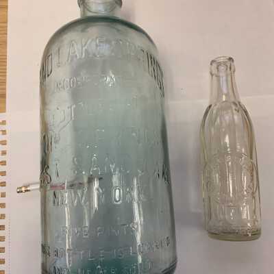 SLHS Sand Lake Springs Bottles