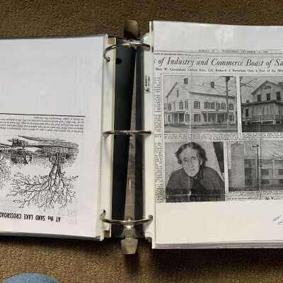Both sides: 1936 article regarding the industry and commerce of Sand Lake