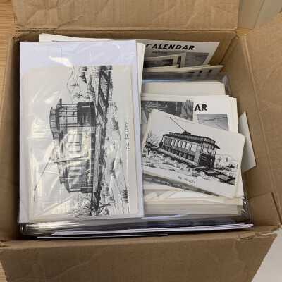 Box of excess SLHS calendar and postcard printed materials: Obviously stores left over or excess printed materials used to produce previously published SLHS fund raising calendars and postcards.  Some of the materials may remain useful for sale during SLHS program presentations.