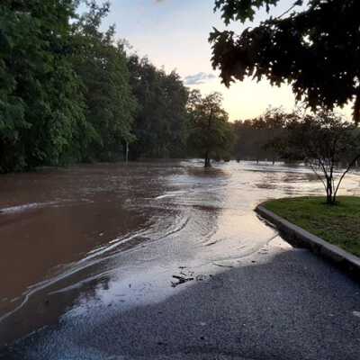 Homeroom Lofts 3: Flooded driveway leading from the current Homeroom Lofts Apartments to toward the playground of the current Miller Hill Elementary School.