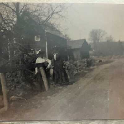 Outbuildings on the Phillip and Suanne Brown farm on Taborton Road. The women are two of their daughters.