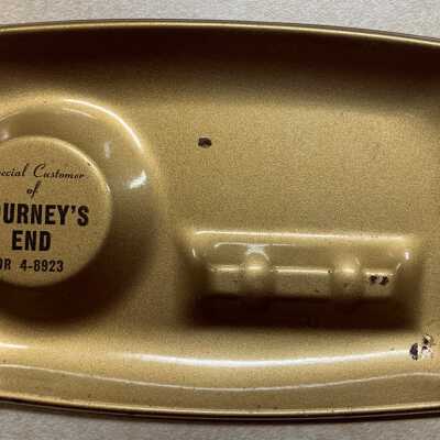 Journey's End Special Customer Ashtray: JPG photo.  Shared by SLHS member Jim during an April 12, 2022, SLHS Show and Tell Program Presentation.  The gold ashtray was reserved for special customers.  Part of his personal collection.