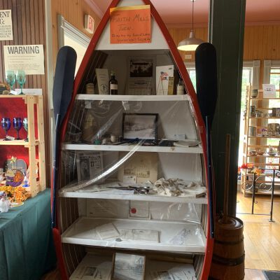 Young's Pharmacy and General Store, Display Case: Display case of the most recent former location of the Faith Mills Collection in the Summer through Fall of 2022.  Display organizer Jackie Tremont appears to have added a few undocumented and likely borrowed items.