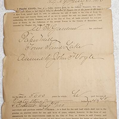 Doc # 40 Certificate of Tax Sale 1900-07-31 P1-of-2: Rensselaer County and NYS tax foreclosure on and public auction of the Sand Lake Paper Mill to William H. Gardner for $49.45. Transfers property from the Sand Lake Paper Mill and John F. Vogle (tax defaulter) to William H. Gardner and further assignment from Gardner to William D. Mahoney on May 14, 1903, for apparent non-payment in taxes in 1898.