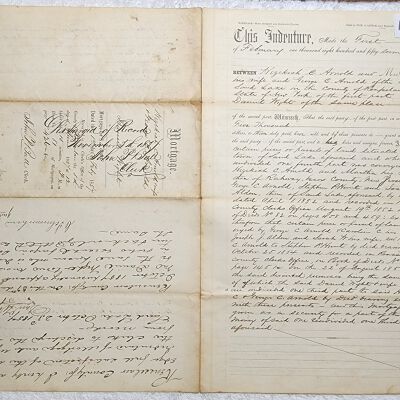 Doc # 109 Indenture 1857-02-01 P1-of-2: Hezekiah C. Arnold, Mary Arnold, and George C. Arnold to Daniel Wright. Appears to transfer land owned by the Arnolds to Wright in consideration of a $5,000 mortgage agreement. An amendment on the back note payment in full on October 23, 1857.
