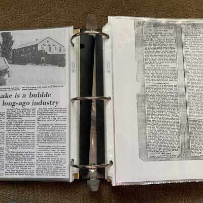 Left: Article regarding July Rowe and Madolyn Carpenter plans to conduct archaeological digs at Glass Lake Village: Right:  Articles regarding Glass Lake Village and the Glass Factory and a dugout canoe and Native American artifacts found in and at Glass Lake.