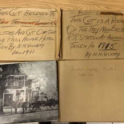 Four Woodcut Printing Plates Stored in SLHS-FC5 D1: Used to produce the Tremont calendars related to the Park House Hotel, Troy and New England Railroad Station, Burden Lake Hotel, and Averill Park Pharmacy.