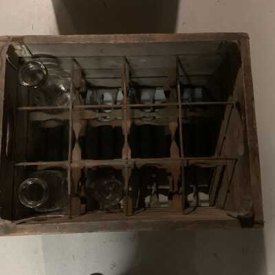 Milk Bottle Crate / Caddy - Top View: Currently used to store all of the TOSL owned milk bottles pictured in this entry.