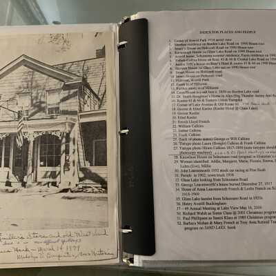 PPB Pages 1 and 2: Left side - Photo of Rymiller's / Ryemiller's store and former West Sand Lake Post Office donated by Agnes Hack in 1979.  Right side displays page 1 of 2 of the numbered photo and memorabilia annotations found throughout the rest of the binder.