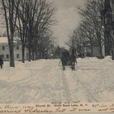 Church Street, West Sand Lake, NY: Church Street, West Sand Lake, NY, postcard.  Inscribed, "Aug. 22, 1907, I walked this way when I arrived Wednesday, but it was 90 degrees in the shade and me with  two suitcases."