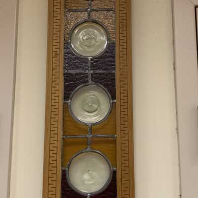 Stained Glass Window - 1 of 2 identical Windows. Left Side: Origin Unknown.  Currently hanging on the wall in the Courtroom of Town Hall.