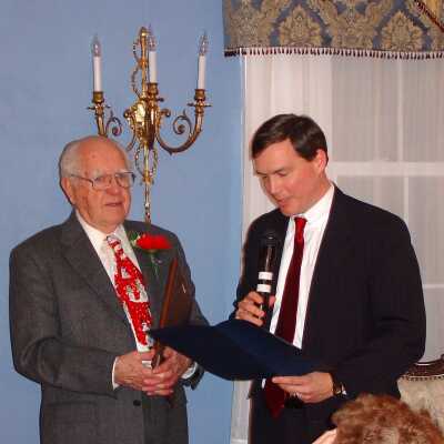 Bob Lilly Recognition and Awards December 2003: Martin Reid award presentation to Bob Lilly - Not part of the binder. Photo found on a random CD in the files and included here because it fits well in this collection.