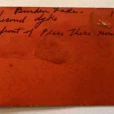 Page Protector 16 - Howell Burden Lake House Closing Hop Ticket - Back: Handwriting notes the location was somewhere near Second Dyke Road and likely the current location of Kay's Restaurant.