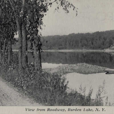 View From Roadway, Burden Lake, NY #1: View From Roadway, Burden Lake, NY, postcard.  Includes man in a boat.  Specimen 1 of 2. 