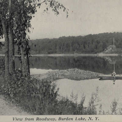 View From Roadway, Burden Lake, NY #2: View From Roadway, Burden Lake, NY, postcard.  Includes man in a boat.  Specimen 2 of 2. 