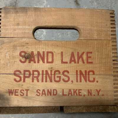 Sand Lake Springs - Box Type 3 - End View: Sand Lake Springs - Box Type 3.  Box only.  No bottles stored in this open container.  Both ends display similar stenciling.