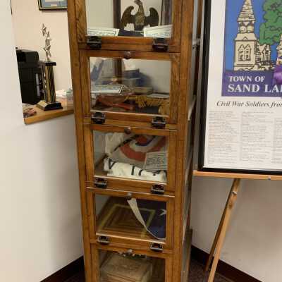 Raymond W. Nash Store Display Cabinet - Front: Cabinet from the Nash Store formerly located in the historic structure situated across from the Cumberland Farms store at the corner of State Routes 66 and 43 in Averill Park in the Town of Sand Lake, NY.  Refer to the following URL if desired for a bit more information:  https://sandlakehistory.org/gas/index.html