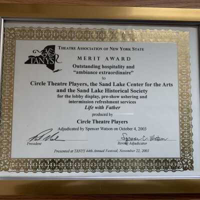 Theater Association of the State of NY, Merit Award, 2003: Awarded to the Sand Lake Historical Society along with the Circle Theater Players and Sand Lake Center for the Arts in 2003 for support of a play entitled Life with Father.  The framed certificate is currently located on top of a SLHS Filing Cabinet 3 near the 2nd Floor rear entrance to the Town Library of the Town Hall of the Town of Sand Lake, NY.