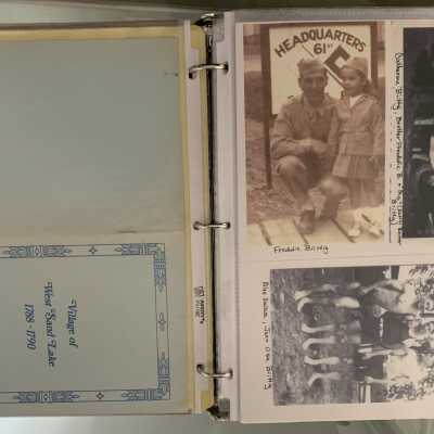 PPB Pages 61 and 62: Left (105) Village of West Sand Lake history by Sanford G. Young.  Right Side more Biittig family photos including WWII photos.