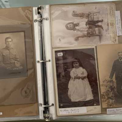 PPB Pages 15 and 16: Left Side (21) Enoch Llyod French wearing WWI uniform.  Right side (22) William Calkins (23) Ester Calkins (24) Frank Calkins.