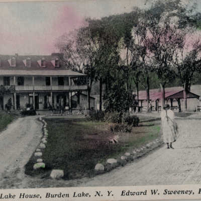 Burden Lake House, Burden Lake, NY, Edward W. Sweeney, Proprietor: Burden Lake House, Burden Lake, NY, Edward W. Sweeney, proprietor postcard.  Today (2021) Kay's Pizza.