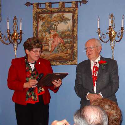 Bob Lilly Recognition and Awards December 2003: Chris Kronau award presentation to Bob Lilly.  Not part of the binder.  Photo found on a random CD in the files and included here because it fits well in this collection.
