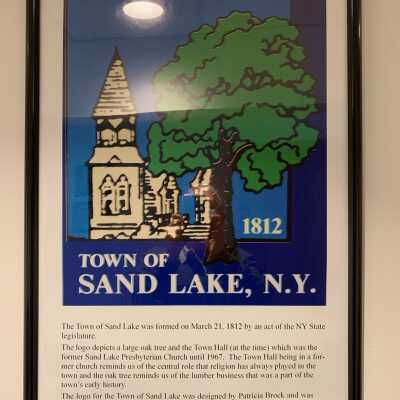 Commemorative Poster, Town of Sand Lake Logo Origin and History: Commemorative Poster, Town of Sand Lake Logo Origin and History.  Designed by Patricia Brook and chosen in 1985 as a result of a contest.