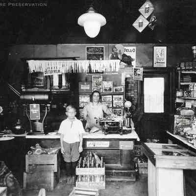 Grandma Tilly and Frank Jarek at store at 2734 [2374] Carver St about 1922