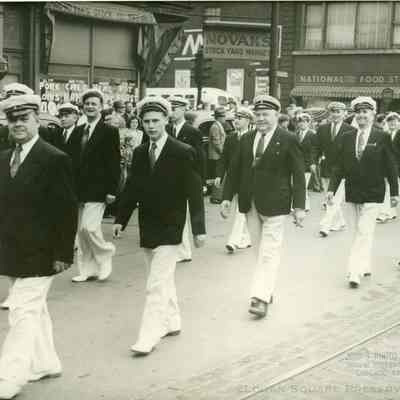 Bjornson Male Chorus marching in Syttende Mai parade