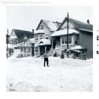 Man walking on snowy Diversey Ave