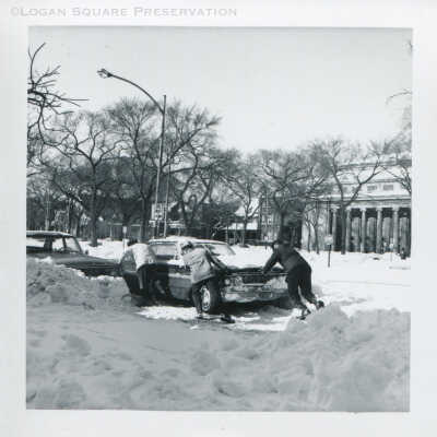 Pushing car out of snowbank