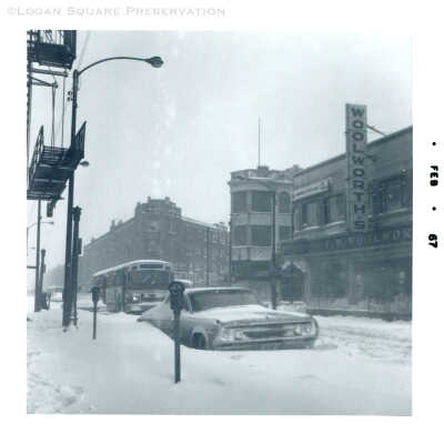 Diversey Ave Bus passing Woolworth's after blizzard