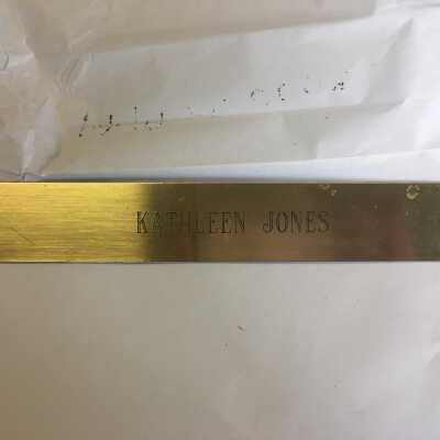 metallic gold nameplate