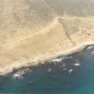 Aerial photo of Port San Luis and Avila Coastline, in photo album from Joyce Hall - Undated 3.5" x 5" color photograph