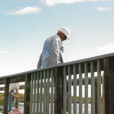 Construction of boardwalk at Oso Flaco Lake, in photo album - Undated 3.5" x 5" color photograph