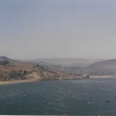 Port San Luis Pier from Pecho Coast Trail, The Nature Conservancy hike, in photo album from Joyce Hall - Undated 3.5" x 5" color photograph