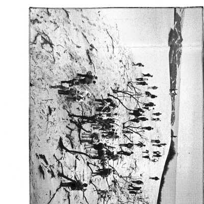 Photograph of Kathleen Goddard Jones walking south at the Nipomo Dunes with a group - June 7 - 1985