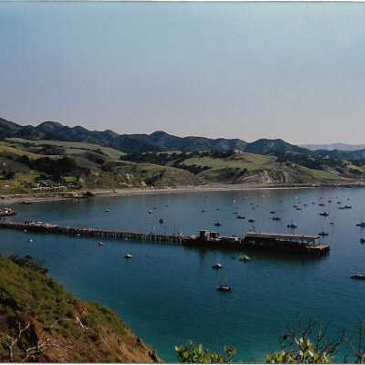 Port San Luis Pier from Pecho Coast Trail, The Nature Conservancy hike, in photo album from Joyce Hall - Undated 3.5" x 5" color photograph