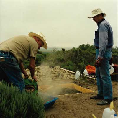 Pictures of the construction sequence of the monumnet on Coreopsis Hill for Joseph Enos and Mary Barcellos Enos for allowing people to lead hikers on their propertyto see the beautiful dune flowers, monument idea by Kathleen Goddard Jones, designed and constructed by Jack Beigle, Al Spierling, Norm Hammond, and Hal Shartz with Kathleen Goddard Jones supervising, 1994 - 4" x 4" color photograph