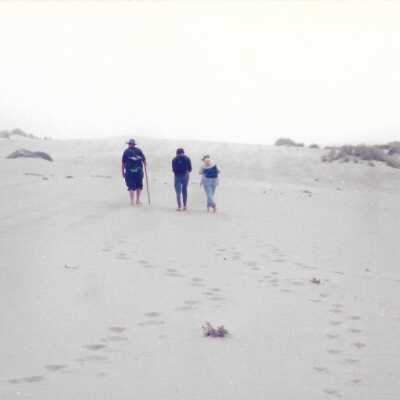 Hikers in Dunes, Note on folder: "removed from display in storage in August 2016" - Undated 4" x 11.5" color photograph