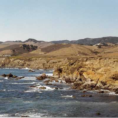 View from Pecho Coast Trail above Port San Luis Pier, The Nature Conservancy hike, in photo album from Joyce Hall - Undated 3.5" x 5" color photograph