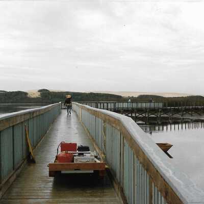 Construction of boardwalk at Oso Flaco Lake, in photo album - Undated 3.5" x 5" color photograph