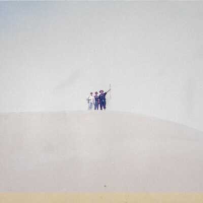 Hikers in Guadalupe- Nipomo Dunes lead by Kathleen Goddard Jones - Undated 6.5" x 13" black and white photograph