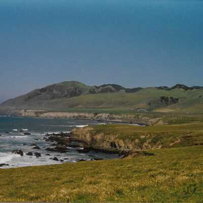 View from Pecho Coast Trail above Port San Luis Pier, The Nature Conservancy hike, in photo album from Joyce Hall - Undated 3.5" x 5" color photograph