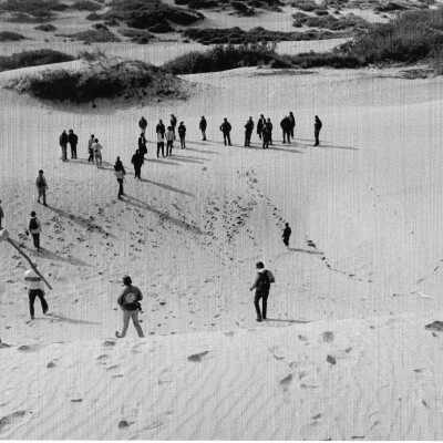 Hikers in Guadalupe- Nipomo Dunes lead by Kathleen Goddard Jones - Undated 4" x 11.5" color photograph