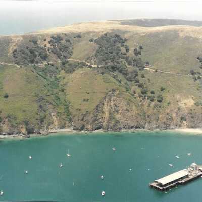 Aerial photo of Port San Luis and Avila Coastline, in photo album from Joyce Hall - Undated 3.5" x 5" color photograph