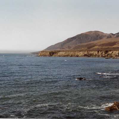 View from Pecho Coast Trail above Port San Luis Pier, The Nature Conservancy hike, in photo album from Joyce Hall - Undated 3.5" x 5" color photograph